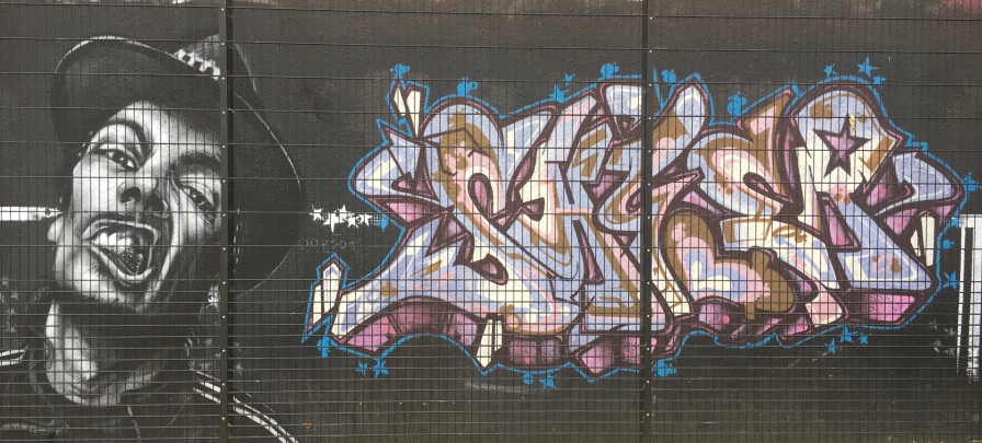 Hood Snarl with Graffiti Street Art - Southwark