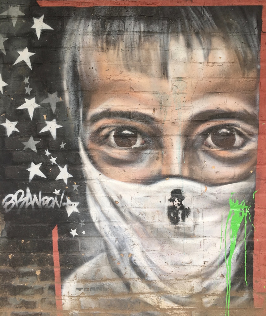 Boy with Mask Street Art - Southwark