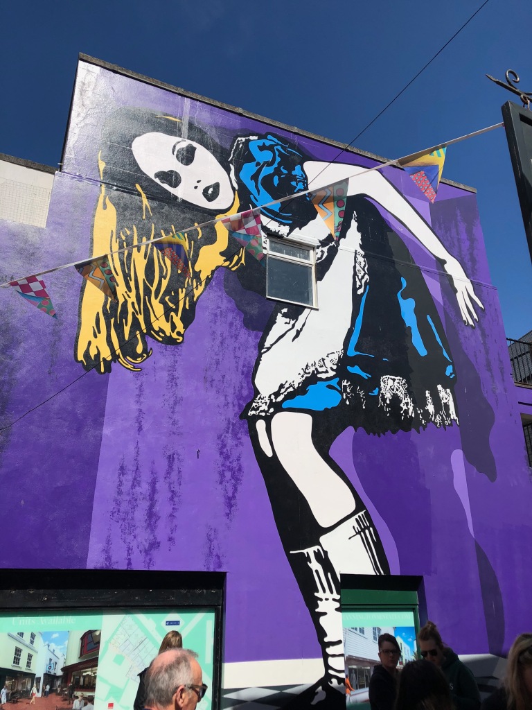 Woman On Side Of Building Street Art - Brighton